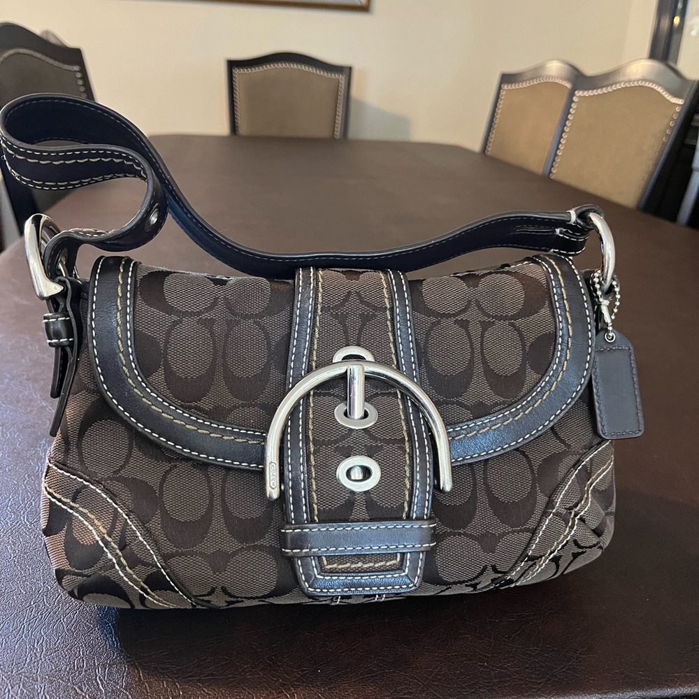 Coach small bag with magnet flap closure. Signature canvas chocolate brown
